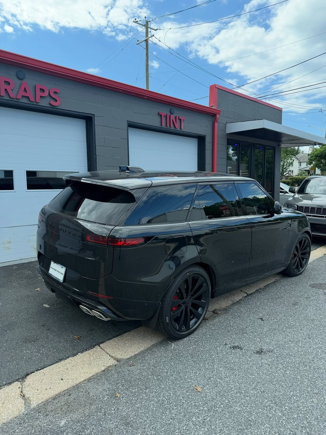 Black Range Rover Sport with XPEL XR Black ceramic window tint